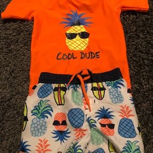 Swim trunks and rashguard